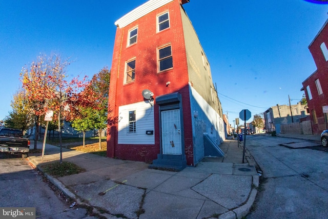 view of building exterior with entry steps