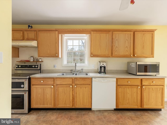 kitchen with appliances with stainless steel finishes and sink