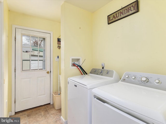 laundry room with washer and clothes dryer