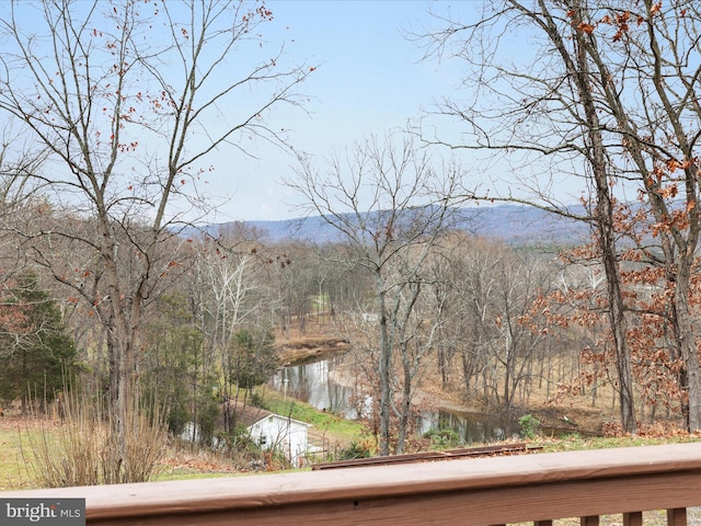 view of mountain feature with a water view