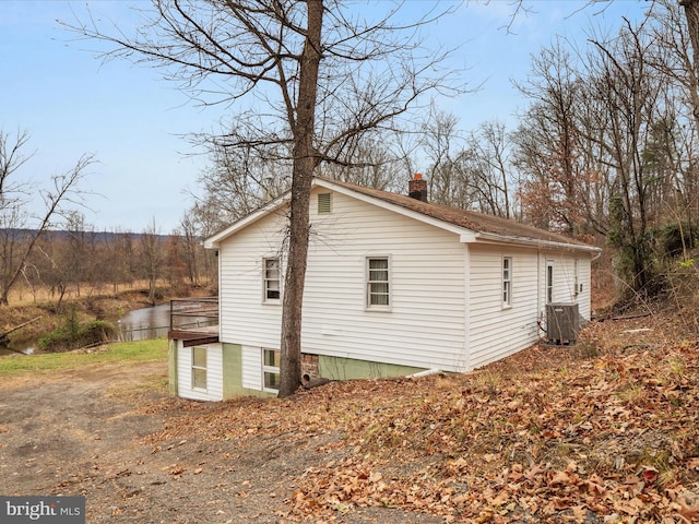 view of home's exterior with cooling unit