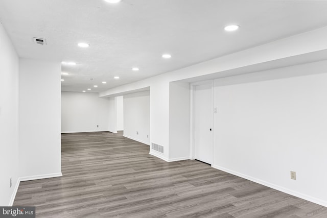 basement with wood-type flooring