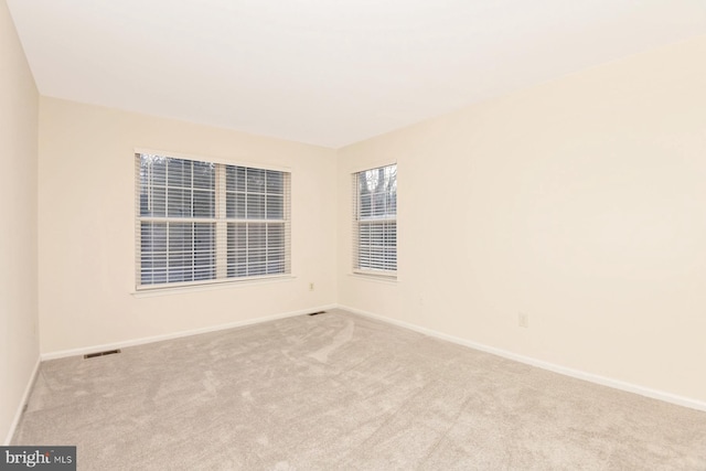 view of carpeted spare room