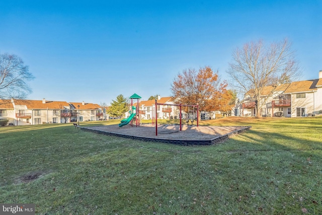 view of jungle gym with a yard