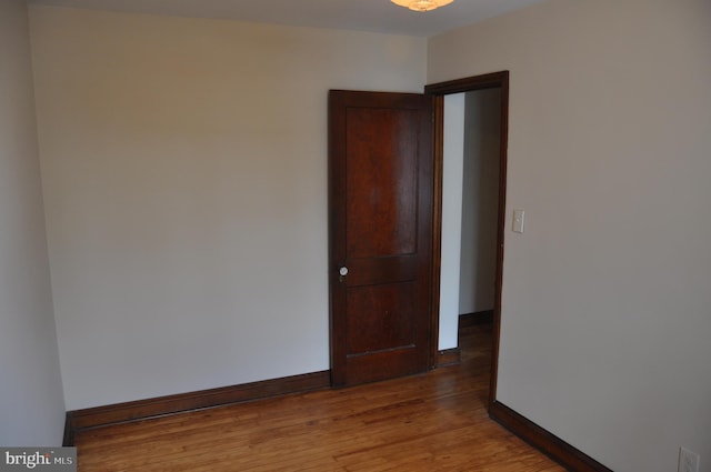 empty room featuring hardwood / wood-style floors