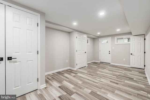 foyer entrance featuring light hardwood / wood-style flooring