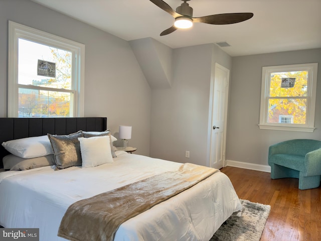 bedroom featuring light hardwood / wood-style flooring and ceiling fan