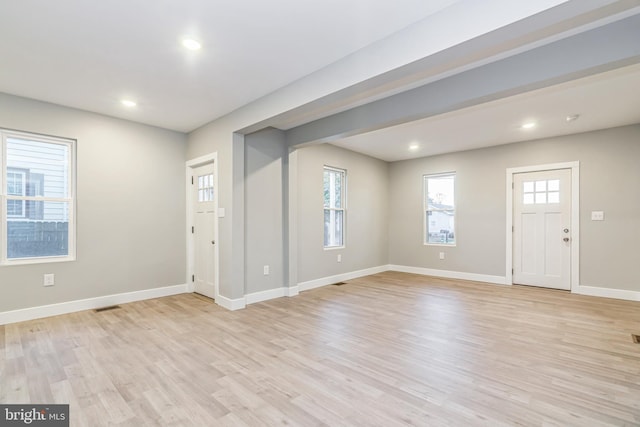 foyer entrance featuring light hardwood / wood-style floors