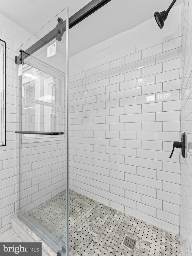 bathroom with an enclosed shower