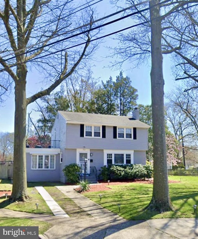 view of front of home with a front yard