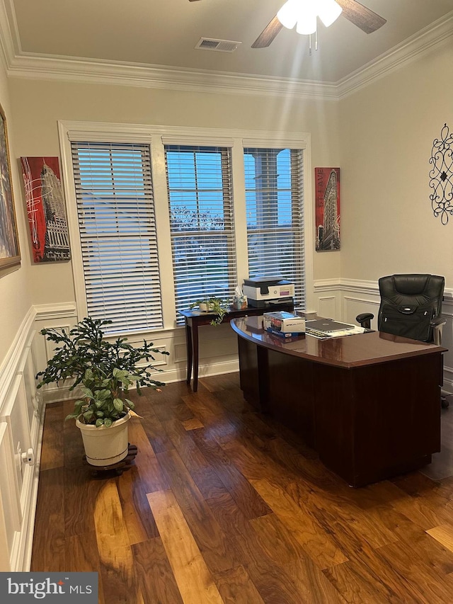 office area featuring ceiling fan, dark wood-type flooring, and ornamental molding