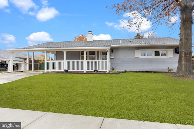 ranch-style home with a front lawn, a porch, and a carport