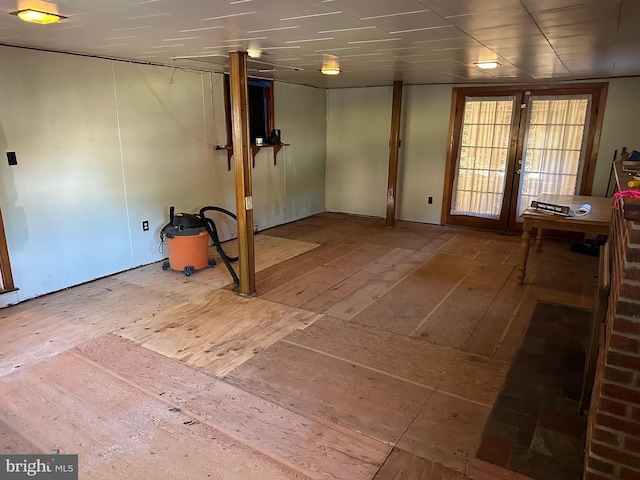 interior space featuring hardwood / wood-style floors and french doors