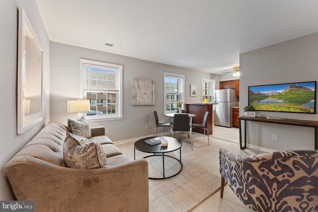 living room featuring ceiling fan