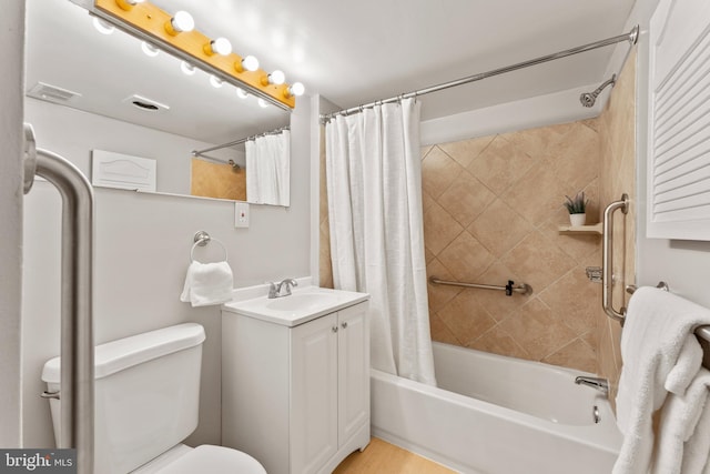 full bathroom featuring vanity, toilet, wood-type flooring, and shower / tub combo with curtain