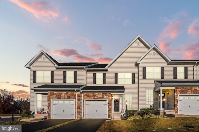 view of front of property featuring a garage