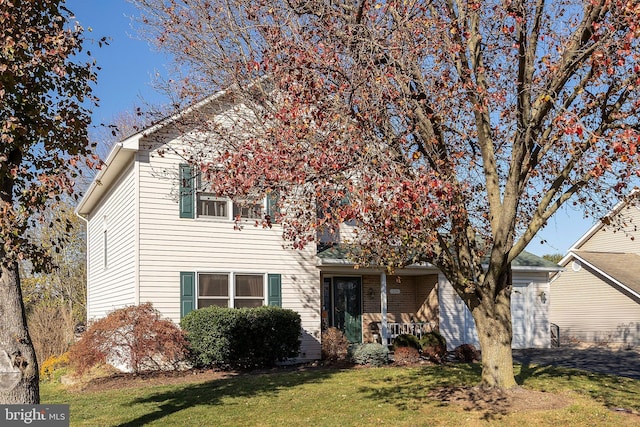 view of front of home with a front lawn