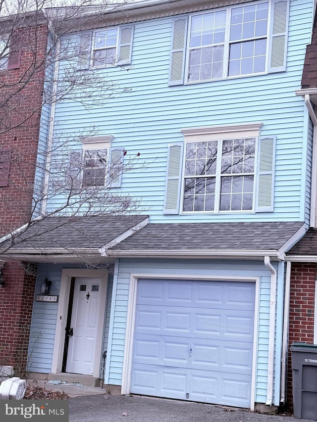 view of property with a garage