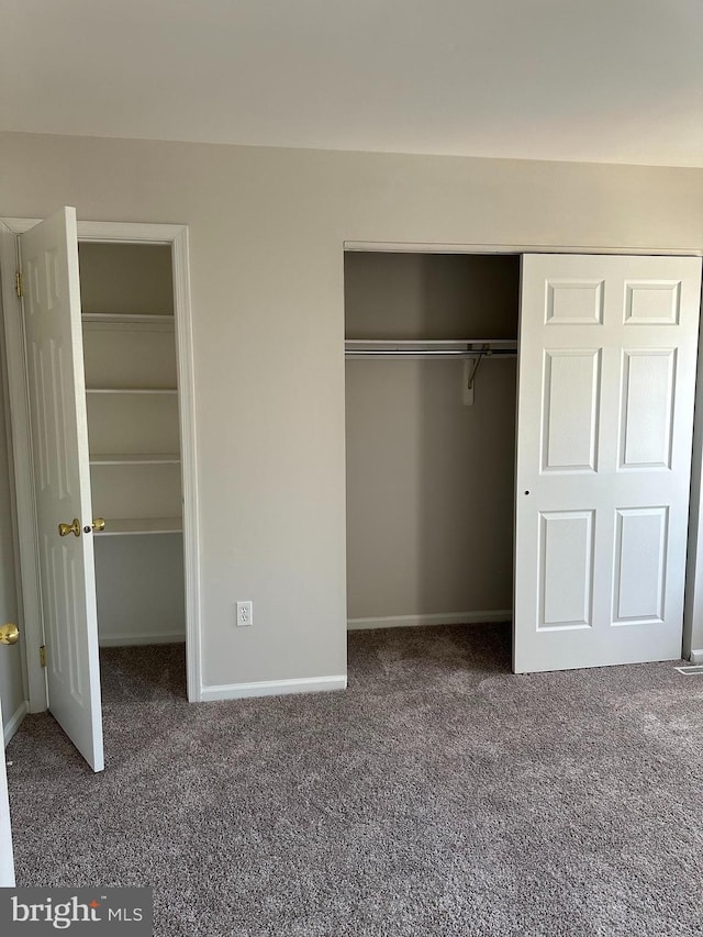 unfurnished bedroom featuring carpet floors