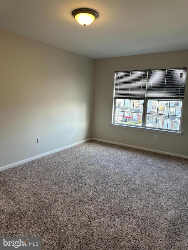 view of carpeted spare room