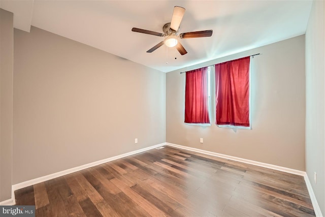 unfurnished room with ceiling fan and hardwood / wood-style floors