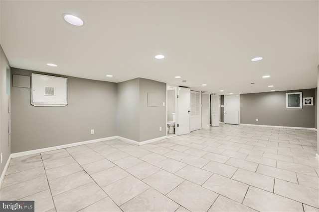 basement with light tile patterned floors