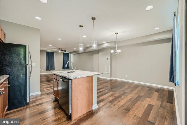 3927 Boarman Ave, Baltimore, MD 21215 - kitchen with appliances with stainless steel finishes, a sink, recessed lighting, open floor plan, and dark wood-style flooring