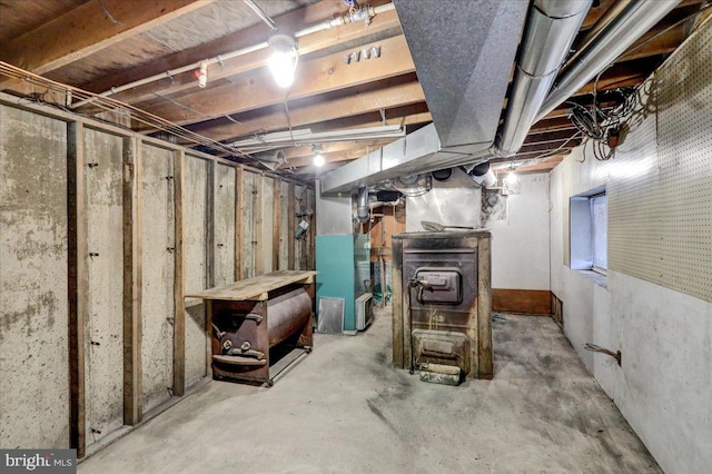 basement featuring heating unit