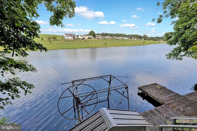 dock area featuring a water view