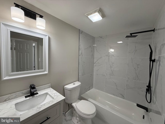 full bathroom with vanity, toilet, and tiled shower / bath combo