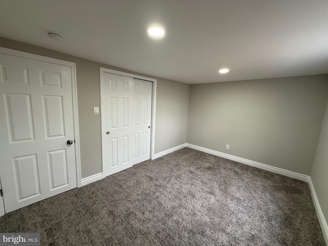 unfurnished bedroom featuring carpet