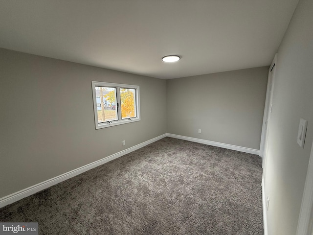 empty room featuring carpet floors