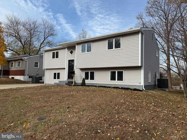 bi-level home featuring central AC unit