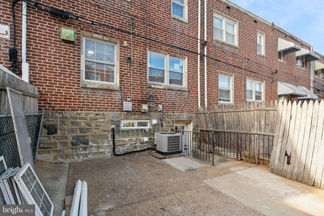 view of patio with central AC