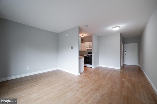 unfurnished living room with light hardwood / wood-style floors