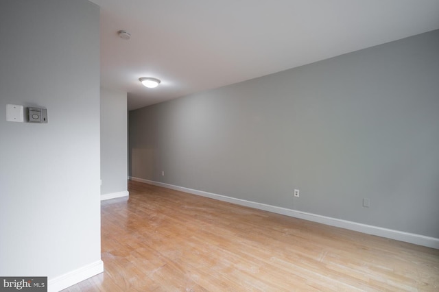 empty room with light wood-type flooring