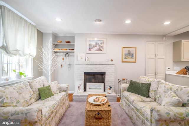 carpeted living room with a fireplace