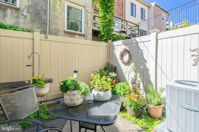 view of patio / terrace with cooling unit