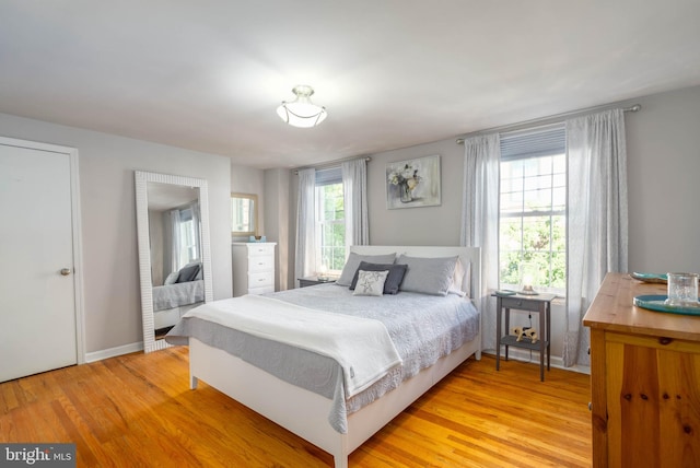 bedroom featuring light wood-type flooring