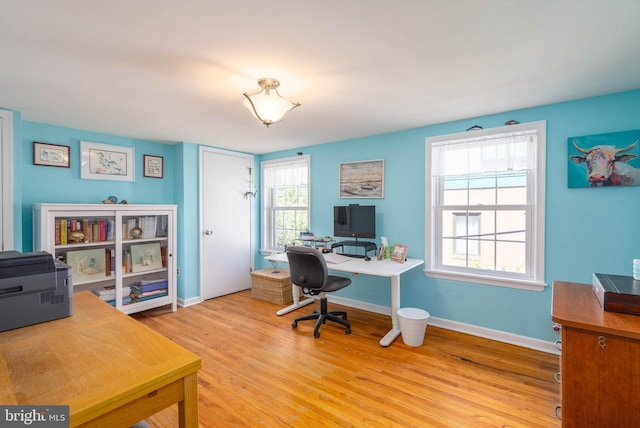 office area with light wood-type flooring