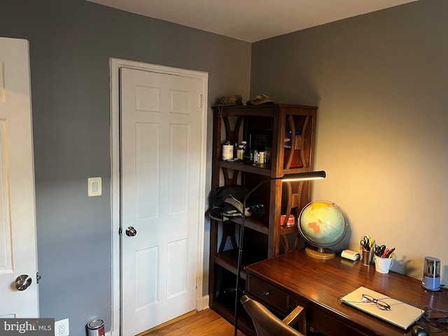 home office featuring light hardwood / wood-style floors