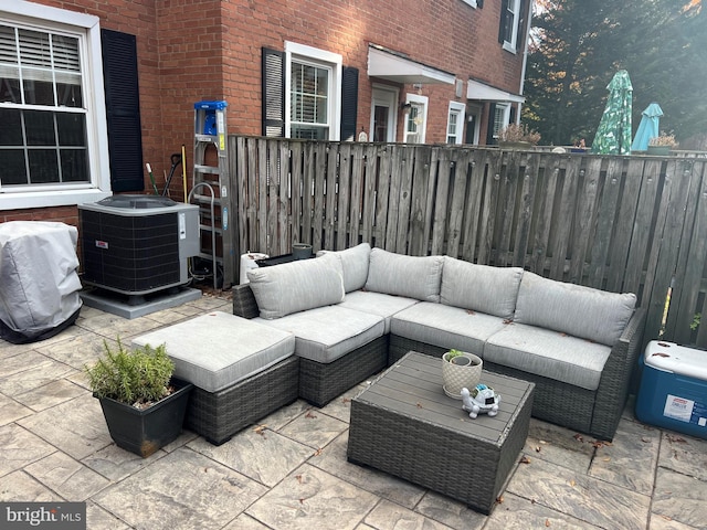 view of patio / terrace featuring outdoor lounge area and central AC