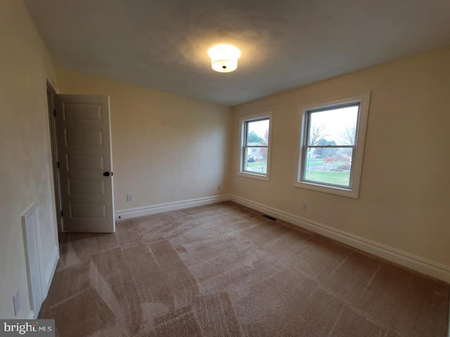 view of carpeted spare room