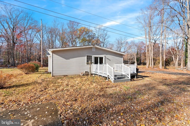 1356 College Rd, Dover, DE 19904 - view of front facade with a deck