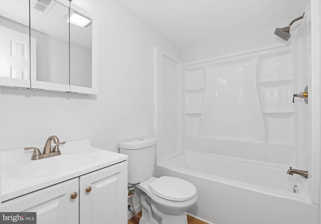 full bathroom with shower / bathing tub combination, vanity, and toilet