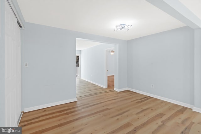 1356 College Rd, Dover, DE 19904 - empty room with baseboards and wood finished floors