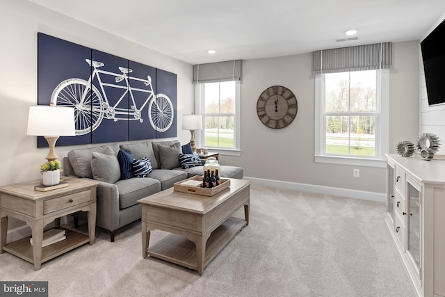 living room featuring light colored carpet