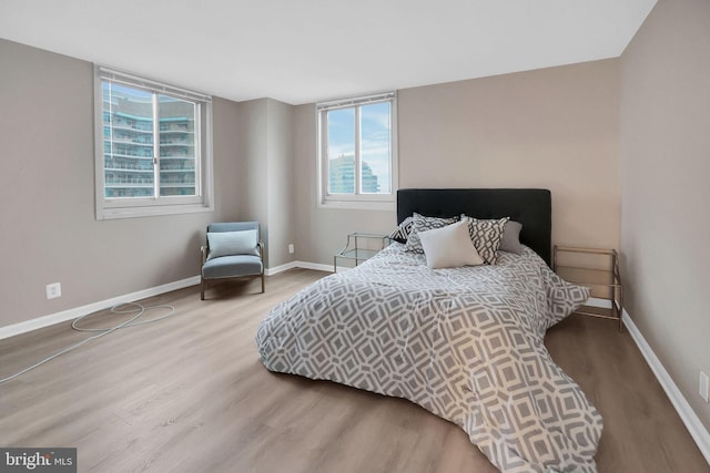 bedroom featuring hardwood / wood-style floors