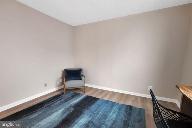 unfurnished room with hardwood / wood-style floors