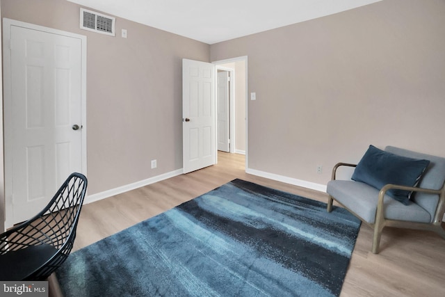 living area featuring light hardwood / wood-style floors